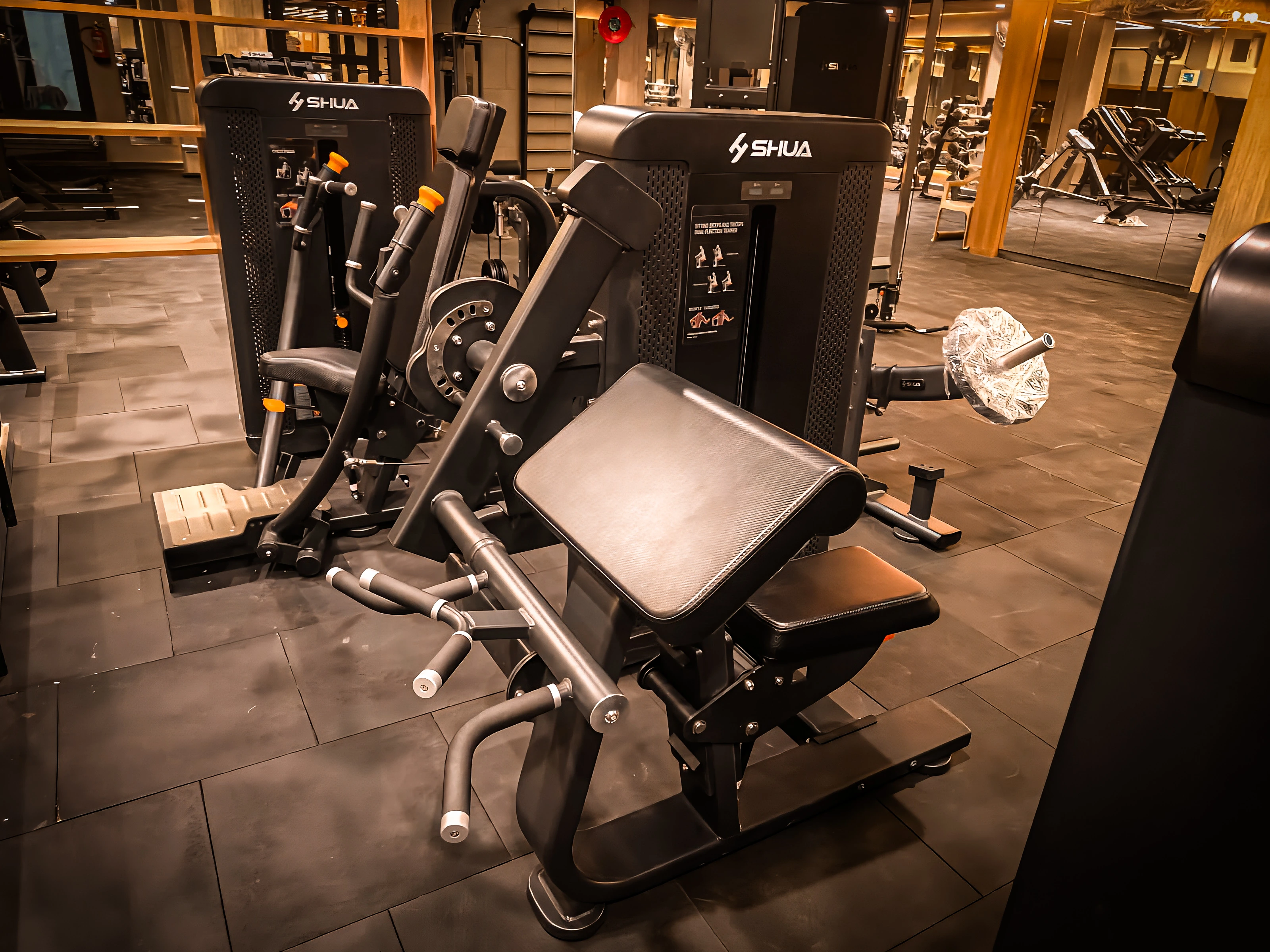 Actual ZOI™ FITNESS gym floor with commercial SHUA strength equipment